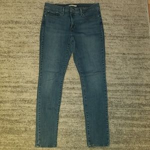 Levi 311 Shaping Skinny Jean's Medium to Dark Wash